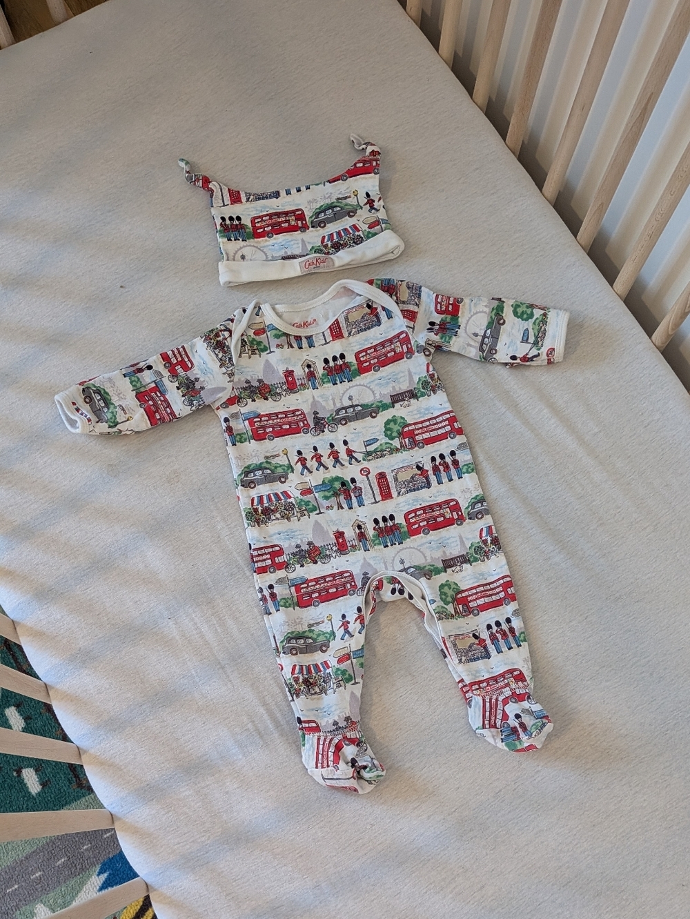 Cath Kids- 3M-6M -  Red and White London Bus Print Baby One-Piece with Hat